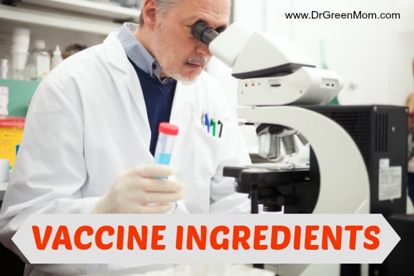 A scientist examines a vaccine sample through a high-powered microscope.