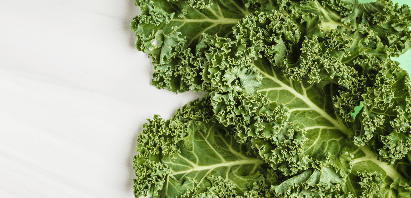 A bunch of kale, which is a good source of Quercetin.