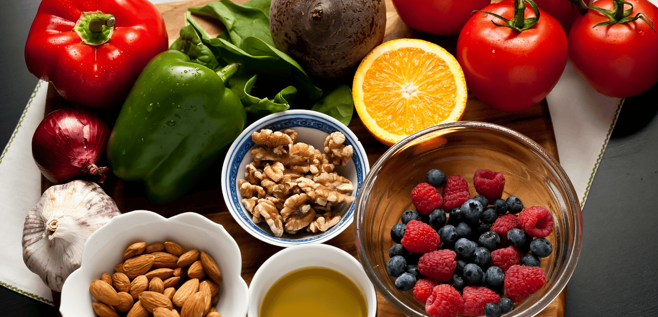 Anti-inflammatory foods for the whole family, such as berries, nuts, lettuce, and lemon.