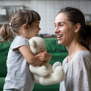 A mom talks to her young daughter. 