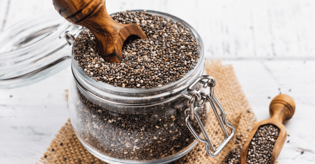 A glass jar of chia seeds.