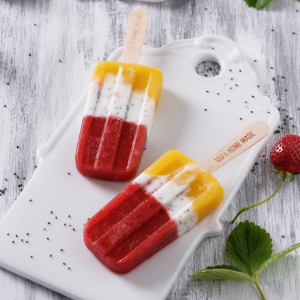 Chia seed popsicles on a white cutting board.