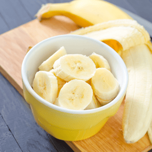 A bowl of sliced bananas. 