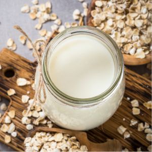 Oat milk creamer in a glass jar.