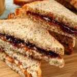 A pb&j sandwich on homemade wheat bread.